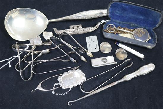 A Malay white metal rice spoon and a quantity of small silver and metal items, including an envelope stamp holder,